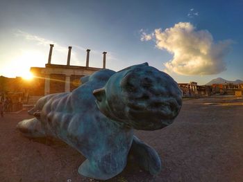 Horse sculpture at sunset