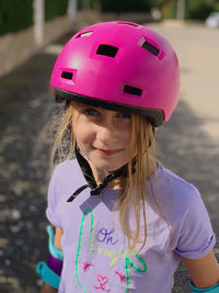Portrait of girl wearing cycling helmet