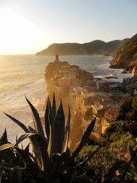 Scenic view of sea against clear sky during sunset