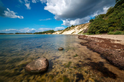 Scenic view of beach against sky