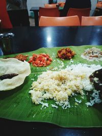 Close-up of served food on table