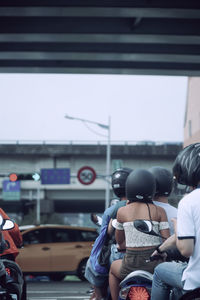 Rear view of people in bus