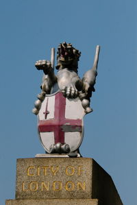 Low angle view of statue against clear sky