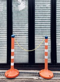 Close-up of closed shutter against wall