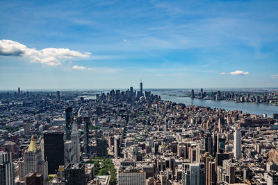 Aerial view of cityscape against sky