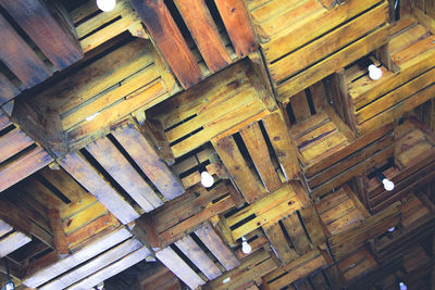 Low angle view of roof made with wood boxes 