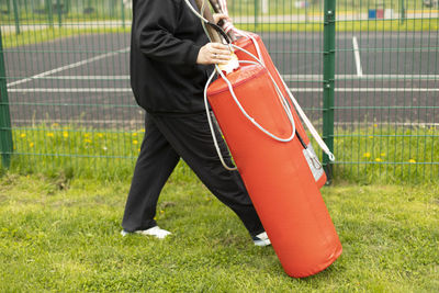 Low section of man playing golf