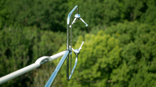 Close-up of wind turbine on field