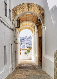 Alley amidst buildings in city