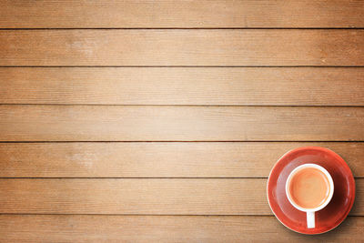Directly above shot of coffee cup on table