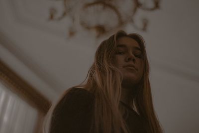 Portrait of a young woman looking at camera