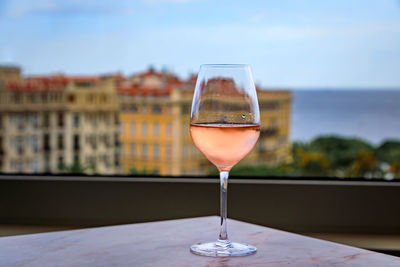 Close-up of wineglass on table