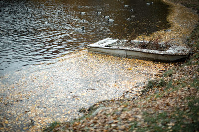 High angle view of abandoned boat in lake