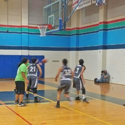 Full length of woman standing by railing