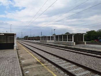 Railroad station platform against sky