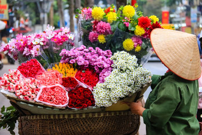 Close-up of flowers in basket for sale