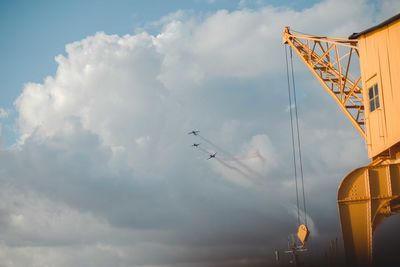 Low angle view of airplane flying in sky