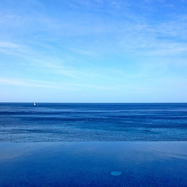 sea, horizon over water, water, beach, tranquil scene, blue, tranquility, scenics, sky, beauty in nature, shore, nature, idyllic, sand, seascape, calm, cloud, coastline, remote, day