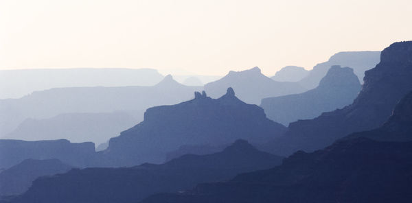 Scenic view of mountains against sky during sunset