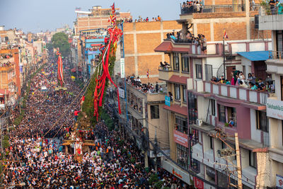 Devotees pull chariots as they take part in the festivities to mark the rato machindranath chariot.