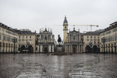 Buildings in city during rainy season