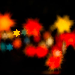 Defocused image of illuminated lights at night