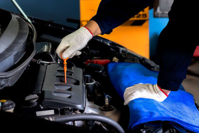 Midsection of man working in bus