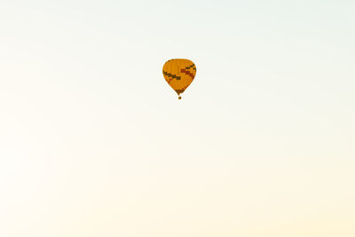 Hot air balloons against clear sky