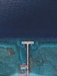 High angle view of old wall by sea