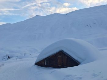 Scenic view of snow covered house during winter