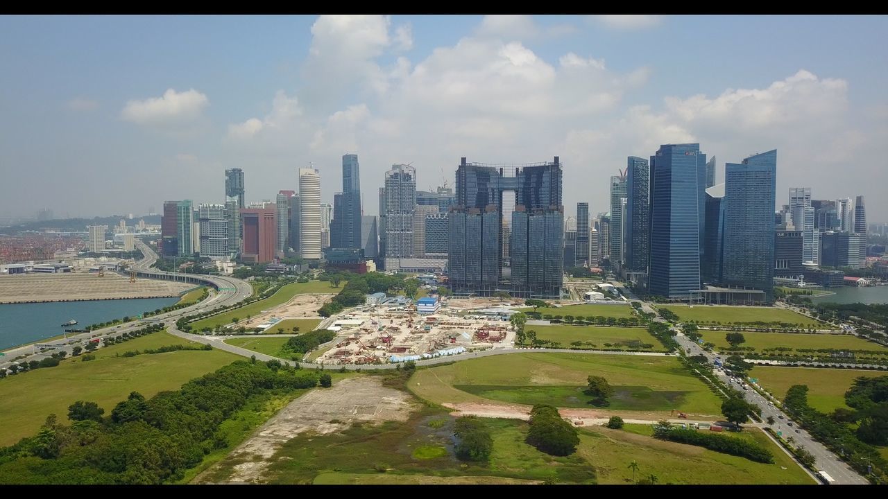 PANORAMIC VIEW OF CITY BUILDINGS AGAINST SKY