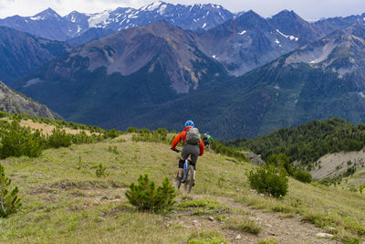 Man riding bicycle on mountain