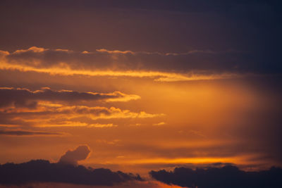 Scenic view of dramatic sky during sunset