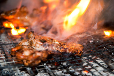 Close-up of food preparing on barbecue