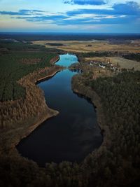 High angle view of river amidst landscape against sky
