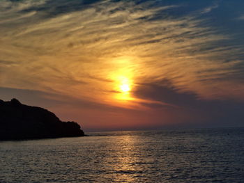 Scenic view of sea at sunset