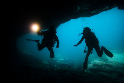 Scuba divers in sea