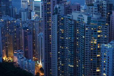 Illuminated buildings in city at night