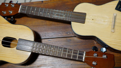 High angle view of guitar on table