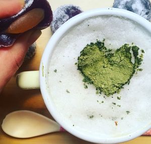 Close-up of hand holding drink