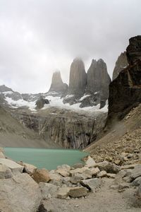 Scenic view of mountain against cloudy sky