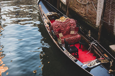 High angle view of red boats moored in canal