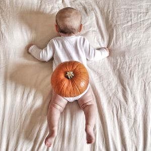 High angle view of baby boy on bed