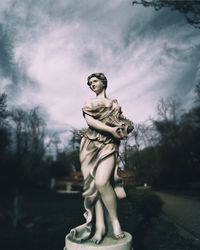 Statue against sky in park