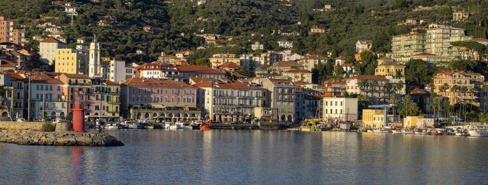 Aerial view of townscape by sea