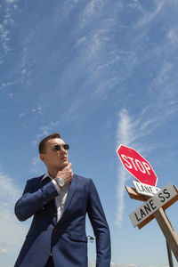 Low angle view of man against sky