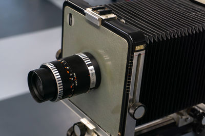 Close-up of camera on table