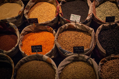Full frame shot of spices and dries beans for sale at market stall
