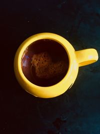High angle view of coffee cup on table