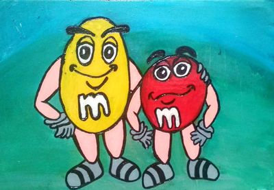 Close-up of two birds on water